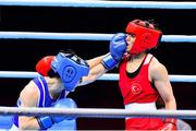 7 June 2021; Kellie Harrington of Ireland, left, and Esra Yildiz of Turkey in their lightweight 60kg semi-final bout on day four of the Road to Tokyo European Boxing Olympic qualifying event at Le Grand Dome in Paris, France. Photo by Baptiste Fernandez/Sportsfile