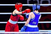 7 June 2021; Esra Yildiz of Turkey, left, and Kellie Harrington of Ireland in their lightweight 60kg semi-final bout on day four of the Road to Tokyo European Boxing Olympic qualifying event at Le Grand Dome in Paris, France. Photo by Baptiste Fernandez/Sportsfile