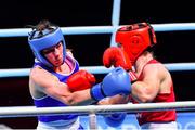 7 June 2021; Aoife O'Rourke of Ireland, left, and Lauren Price of Great Britain in their middleweight 75kg semi-final bout on day four of the Road to Tokyo European Boxing Olympic qualifying event at Le Grand Dome in Paris, France. Photo by Baptiste Fernandez/Sportsfile