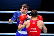 7 June 2021; Aidan Walsh of Ireland, left, and Pat McCormack of Great Britain in their welterweight 69kg semi-final bout on day four of the Road to Tokyo European Boxing Olympic qualifying event at Le Grand Dome in Paris, France. Photo by Baptiste Fernandez/Sportsfile