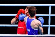 7 June 2021; Pat McCormack of Great Britain, left, and Aidan Walsh of Ireland in their welterweight 69kg semi-final bout on day four of the Road to Tokyo European Boxing Olympic qualifying event at Le Grand Dome in Paris, France. Photo by Baptiste Fernandez/Sportsfile