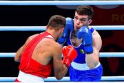 7 June 2021; Emmet Brennan of Ireland, right, and Liridon Nuha of Sweden in their light heavyweight 81kg Box Off for Olympic Place bout on day four of the Road to Tokyo European Boxing Olympic qualifying event at Le Grand Dome in Paris, France. Photo by Baptiste Fernandez/Sportsfile