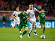 8 June 2021; Attila Szalai of Hungary in action against Jason Knight of Republic of Ireland during the international friendly match between Hungary and Republic of Ireland at Szusza Ferenc Stadion in Budapest, Hungary. Photo by Alex Nicodim/Sportsfile