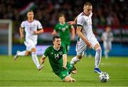 8 June 2021; Attila Szalai of Hungary in action against Jason Knight of Republic of Ireland during the international friendly match between Hungary and Republic of Ireland at Szusza Ferenc Stadion in Budapest, Hungary. Photo by Alex Nicodim/Sportsfile