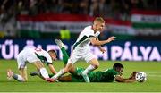 8 June 2021; Chiedozie Ogbene of Republic of Ireland in action against András Schafer and Janos Hahn, left, of Hungary during the international friendly match between Hungary and Republic of Ireland at Szusza Ferenc Stadion in Budapest, Hungary. Photo by Alex Nicodim/Sportsfile