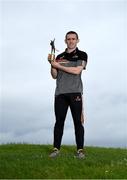 9 June 2021; Antrim hurler Ciaran Clarke with his PwC GAA / GPA Player of the Month award in Hurling for May 2021 at Páirc Mac Uílín, in Ballycastle, County Antrim.  Photo by Harry Murphy/Sportsfile