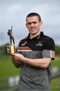9 June 2021; Antrim hurler Ciaran Clarke with his PwC GAA / GPA Player of the Month award in Hurling for May 2021 at Páirc Mac Uílín, in Ballycastle, County Antrim.  Photo by Harry Murphy/Sportsfile