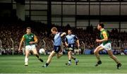 9 June 1991; Barney Rock of Dublin in action against Liam Hayes, left, and Liam Harnan of Meath during the Leinster GAA Football Senior Championship Preliminary Round replay match between Dublin and Meath at Croke Park in Dublin. Photo by David Maher/Sportsfile