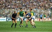 9 June 1991; Charlie Redmond of Dublin in action against Martin O'Connell, right, and Colm O'Rourke of Meath, in the company of referee Tommy Howard, during the Leinster GAA Football Senior Championship Preliminary Round replay match between Dublin and Meath at Croke Park in Dublin. Photo by David Maher/Sportsfile