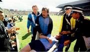 2 June 1991; Charlie Redmond of Dublin is stretchered from the pitch during the Leinster Senior Football Championship Preliminary Round match between Dublin and Meath at Croke Park in Dublin. Photo by Ray McManus/Sportsfile