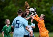 9 June 2021; Muireann Devaney of Republic of Ireland contests possession against Northern Ireland goalkeeper Rachel Norney during the Women's U19 International Friendly between Republic of Ireland and Northern Ireland at AUL Complex in Dublin. Photo by Piaras Ó Mídheach/Sportsfile