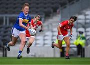 21 May 2021; Aishling Moloney of Tipperary in action against Aisling Kelleher, left, and Erika O'Shea of Cork  during the Lidl Ladies Football National League Division 1B Round 1 match between Cork and Tipperary at Páirc Uí Chaoimh in Cork. Photo by Piaras Ó Mídheach/Sportsfile