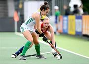 11 June 2021; Hannah McLoughin of Ireland in action against Isabelle Petter of England during the Women's EuroHockey Championships Pool C match between Ireland and England at Wagener Hockey Stadium in Amstelveen, Netherlands. Photo by Frank Uijlenbroek/World Sport Pics/Sportsfile