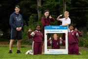 11 June 2021; Minister of State for Sport and the Gaeltacht Jack Chambers TD with 6th class pupils from his former school St. Brigid's National School, from left, Nero Arubayi, Phoebe Duncan, Aveen McDonnell, Jarlath O'Farrell and Sibbhant Raipal at the Daily Mile launch at St. Brigid's National School, Beechpark Lawn, Castleknock in Dublin.  Photo by Matt Browne/Sportsfile