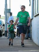 11 June 2021; Cork City supporter Derry Crean with his son Sam, age 6, arrive ahead of the SSE Airtricity League First Division match between Cork City and Cabinteely at Turners Cross in Cork. Photo by Michael P Ryan/Sportsfile
