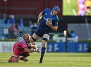 11 June 2021; Ryan Baird of Leinster is tackled by Brok Harris of Dragons during the Guinness PRO14 match between Leinster and Dragons at RDS Arena in Dublin. The game is one of the first of a number of pilot sports events over the coming weeks which are implementing guidelines set out by the Irish government to allow for the safe return of spectators to sporting events. Photo by Brendan Moran/Sportsfile