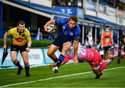 11 June 2021; Jordan Larmour of Leinster escapes the tackle of Ioan Davies of Dragons on his way to scoring his sides third try during the Guinness PRO14 match between Leinster v Dragons at RDS Arena in Dublin. The game is one of the first of a number of pilot sports events over the coming weeks which are implementing guidelines set out by the Irish government to allow for the safe return of spectators to sporting events. Photo by Harry Murphy/Sportsfile