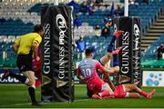 11 June 2021; Garry Ringrose of Leinster on his way to scoring his side's second try despite the tackle of Rio Dyer, hidden, and Sam Davies of Dragons during the Guinness PRO14 match between Leinster v Dragons at RDS Arena in Dublin. The game is one of the first of a number of pilot sports events over the coming weeks which are implementing guidelines set out by the Irish government to allow for the safe return of spectators to sporting events. Photo by Harry Murphy/Sportsfile