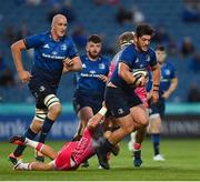 11 June 2021; Vakh Abdaladze of Leinster is tackled by Gonzalo Bertranou of Dragons during the Guinness PRO14 match between Leinster and Dragons at RDS Arena in Dublin. The game is one of the first of a number of pilot sports events over the coming weeks which are implementing guidelines set out by the Irish government to allow for the safe return of spectators to sporting events. Photo by Ramsey Cardy/Sportsfile