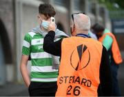 11 June 2021; A spectator has his temperature taken before the SSE Airtricity League Premier Division match between Shamrock Rovers and Finn Harps at Tallaght Stadium in Dublin. The game is one of the first of a number of pilot sports events over the coming weeks which are implementing guidelines set out by the Irish government to allow for the safe return of spectators to sporting events. Photo by Stephen McCarthy/Sportsfile