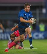 11 June 2021; Jordan Larmour of Leinster is tackled by Jamie Roberts of Dragons during the Guinness PRO14 match between Leinster and Dragons at RDS Arena in Dublin. The game is one of the first of a number of pilot sports events over the coming weeks which are implementing guidelines set out by the Irish government to allow for the safe return of spectators to sporting events. Photo by Ramsey Cardy/Sportsfile