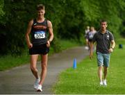 12 June 2021; Coach Rob Heffernan encourages his athlete David Kenny of Farranfore Maine Valley AC during the 20km walk at the Irish Life Health National 20k Walks Championships at St Jarlath’s College in Tuam, Galway. Photo by Seb Daly/Sportsfile
