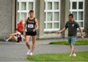 12 June 2021; David Kenny of Farranfore Maine Valley AC competes in the 20km walk, as he is watched by his coach Rob Heffernan, during the Irish Life Health National 20k Walks Championships at St Jarlath’s College in Tuam, Galway. Photo by Seb Daly/Sportsfile