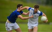 12 June 2021; Conor Madden of Cavan in action against Jamie Snell of Wicklow during the Allianz Football League Division 3 Relegation play-off match between Cavan and Wicklow at Páirc Tailteann in Navan, Meath. Photo by Stephen McCarthy/Sportsfile