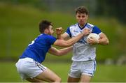 12 June 2021; Conor Madden of Cavan in action against Jamie Snell of Wicklow during the Allianz Football League Division 3 Relegation play-off match between Cavan and Wicklow at Páirc Tailteann in Navan, Meath. Photo by Stephen McCarthy/Sportsfile
