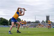 12 June 2021; Diarmuid Ryan of Clare takes a sideline cut during the Allianz Hurling League Division 1 Group B Round 5 match between Clare and Kilkenny at Cusack Park in Ennis, Clare. Photo by Ramsey Cardy/Sportsfile