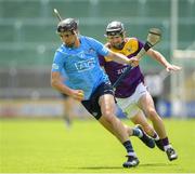 12 June 2021; Danny Sutcliffe of Dublin in action against Connal Flood of Wexford during the Allianz Hurling League Division 1 Round 5 match between Wexford and Dublin at Chadwicks Wexford Park in Wexford. Photo by Matt Browne/Sportsfile
