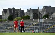 12 June 2021; Peter Harte, left, and Tyrone joint-manager Brian Dooher walk the pitch before the Allianz Football League Division 1 semi-final match between Kerry and Tyrone at Fitzgerald Stadium in Killarney, Kerry. Photo by Brendan Moran/Sportsfile
