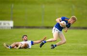 12 June 2021; Kevin Quinn of Wicklow and Conor Smith of Cavan during the Allianz Football League Division 3 Relegation play-off match between Cavan and Wicklow at Páirc Tailteann in Navan, Meath. Photo by Stephen McCarthy/Sportsfile