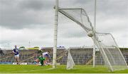 12 June 2021; Seanie Furlong of Wicklow scores his side's second goal past Cavan goalkeeper Raymond Galligan during the Allianz Football League Division 3 Relegation play-off match between Cavan and Wicklow at Páirc Tailteann in Navan, Meath. Photo by Stephen McCarthy/Sportsfile