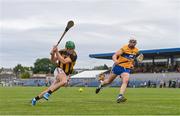 12 June 2021; Eoin Cody of Kilkenny shoots at goal under pressure from Conor Cleary of Clare during the Allianz Hurling League Division 1 Group B Round 5 match between Clare and Kilkenny at Cusack Park in Ennis, Clare. Photo by Ramsey Cardy/Sportsfile