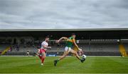 12 June 2021; David Clifford of Kerry races clear of Ronan McNamee of Tyrone during the Allianz Football League Division 1 semi-final match between Kerry and Tyrone at Fitzgerald Stadium in Killarney, Kerry. Photo by Brendan Moran/Sportsfile