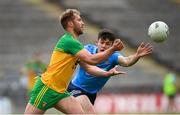 12 June 2021; Stephen McMenamin of Donegal in action against David Byrne of Dublin during the Allianz Football League Division 1 semi-final match between Donegal and Dublin at Kingspan Breffni Park in Cavan. Photo by Stephen McCarthy/Sportsfile