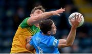 12 June 2021; Brian Fenton of Dublin in action against Hugh McFadden of Donegal during the Allianz Football League Division 1 semi-final match between Donegal and Dublin at Kingspan Breffni Park in Cavan. Photo by Stephen McCarthy/Sportsfile