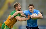 12 June 2021; Con O'Callaghan of Dublin in action against Stephen McMenamin of Donegal during the Allianz Football League Division 1 semi-final match between Donegal and Dublin at Kingspan Breffni Park in Cavan. Photo by Stephen McCarthy/Sportsfile