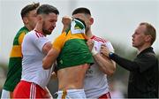 12 June 2021; Limesman Jonathan Hayes attempts to seperate Matthew Donnelly of Tyrone and Micheál Burns of Kerry  during the Allianz Football League Division 1 semi-final match between Kerry and Tyrone at Fitzgerald Stadium in Killarney, Kerry. Photo by Brendan Moran/Sportsfile