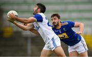 12 June 2021; Conor Smith of Cavan in action against Jamie Snell of Wicklow during the Allianz Football League Division 3 Relegation play-off match between Cavan and Wicklow at Páirc Tailteann in Navan, Meath. Photo by Stephen McCarthy/Sportsfile