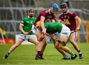 13 June 2021; Tom Morrissey of Limerick in action against Tommy Doyle, left, and Aonghus Clarke of Westmeath during the Allianz Hurling League Division 1 Group A Round 5 match between Westmeath and Limerick at TEG Cusack Park in Mullingar, Westmeath. Photo by Seb Daly/Sportsfile