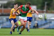 13 June 2021; Aidan O'Shea of Mayo in action against Gavin Cooney of Clare during the Allianz Football League Division 2 semi-final match between Clare and Mayo at Cusack Park in Ennis, Clare. Photo by Brendan Moran/Sportsfile
