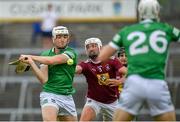 13 June 2021; Kyle Hayes of Limerick shoots to score his side's first goal, despite pressure from Westmeath's Tommy Gallagher, during the Allianz Hurling League Division 1 Group A Round 5 match between Westmeath and Limerick at TEG Cusack Park in Mullingar, Westmeath. Photo by Seb Daly/Sportsfile