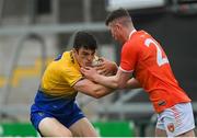 13 June 2021; Richard Hughes of Roscommon is tackled by Tiernan Kelly of Armagh during the Allianz Football League Division 1 Relegation play-off match between Armagh and Roscommon at Athletic Grounds in Armagh. Photo by Ramsey Cardy/Sportsfile