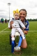 13 June 2021; Avril Gyne of Breaffy celebrates with her niece Saoirse, aged five months, and the trophy after the Ladies Senior Rounders Final 2020 match between Breaffy and Glynn Barntown at GAA centre of Excellence, National Sports Campus in Abbotstown, Dublin. Photo by Harry Murphy/Sportsfile