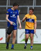 13 June 2021; Clare players Stephen Ryan, left, and Seán Collins leave the pitch after the Allianz Football League Division 2 semi-final match between Clare and Mayo at Cusack Park in Ennis, Clare. Photo by Brendan Moran/Sportsfile