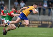 13 June 2021; Conor Jordan of Clare is tackled by Eoghan O'Donoghue of Mayo during the Allianz Football League Division 2 semi-final match between Clare and Mayo at Cusack Park in Ennis, Clare. Photo by Brendan Moran/Sportsfile