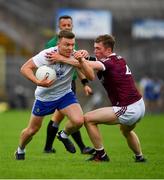 13 June 2021; Kieran Hughes of Monaghan in action against Jack Glynn of Galway during the Allianz Football League Division 1 Relegation play-off match between Monaghan and Galway at St. Tiernach’s Park in Clones, Monaghan. Photo by Ray McManus/Sportsfile