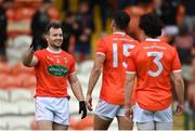 13 June 2021; Ross Finn, left, Stefan Campbell, centre, and James Morgan of Armagh following their side's victory in the Allianz Football League Division 1 Relegation play-off match between Armagh and Roscommon at Athletic Grounds in Armagh. Photo by Ramsey Cardy/Sportsfile